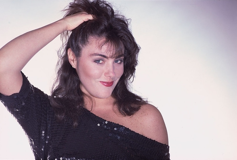 #8 Laura Branigan Wearing a Sequined Blouse, 1983.