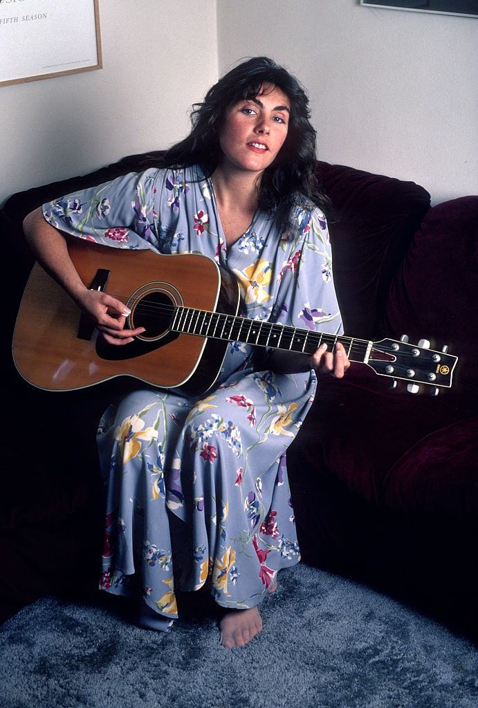 #29 Laura Branigan playing guitar, 1982.