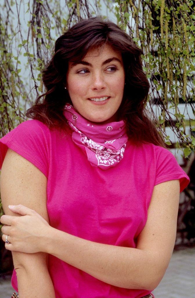 #12 Laura Branigan in pink shirt, 1984.