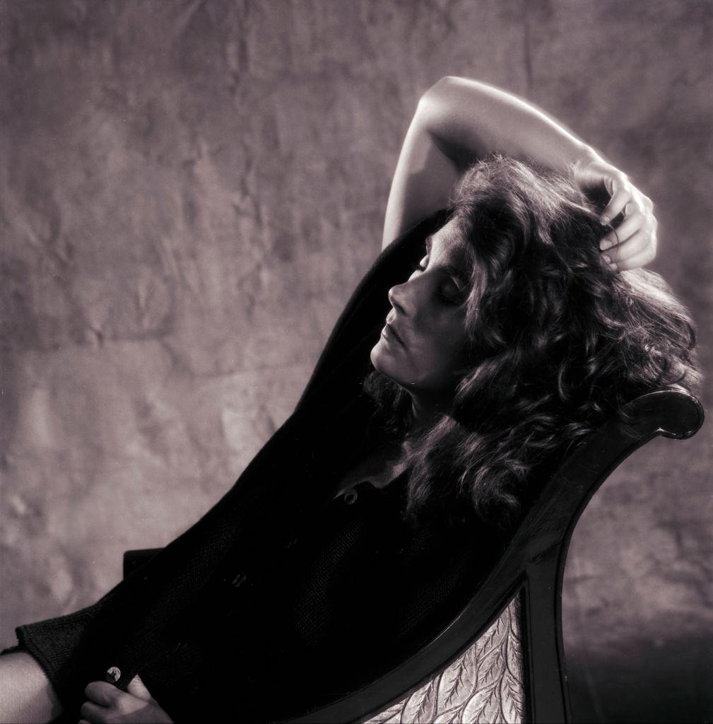 #52 Laura Branigan posing on the chair, 1985.