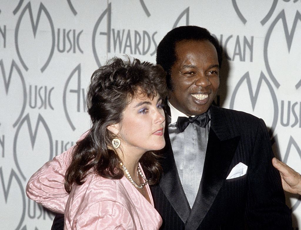#23 Laura Branigan with Lou Rawls during The 14th Annual American Music Awards at Shrine Auditorium in Los Angeles.