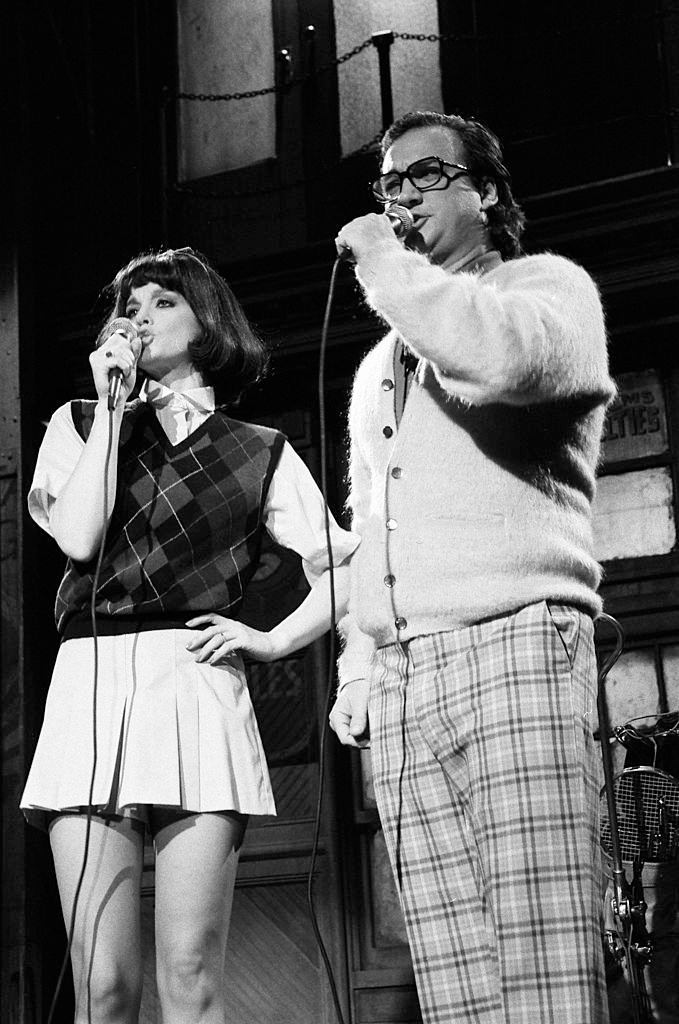 #52 Pamela Sue Martin with Jim Belushi, 1985.