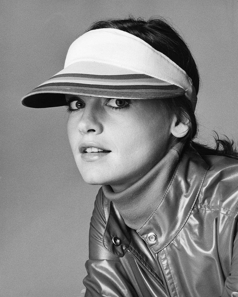 #10 Pamela Sue Martin wearing a sports visor, 1977.