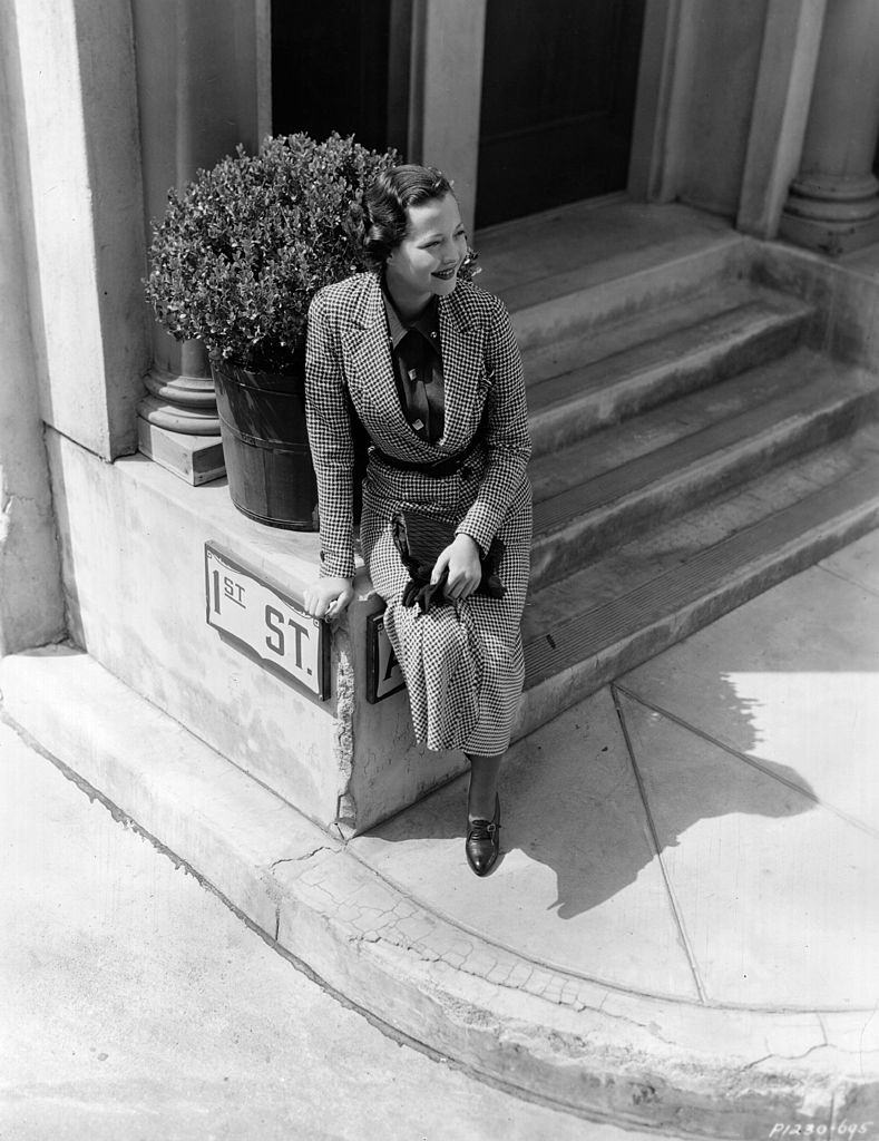 #51 Sylvia Sidney on the steps of her dressing room on the Paramount studio lot, 1935.
