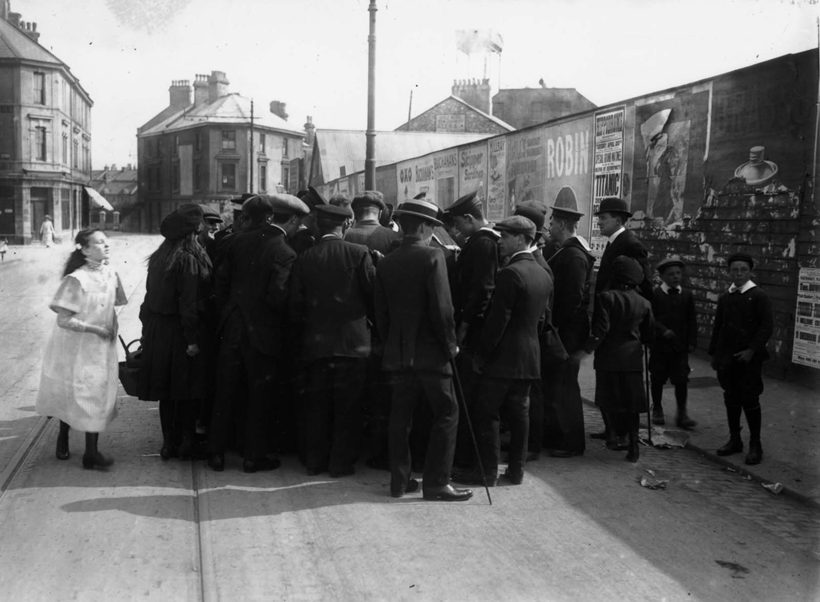 #36 A crowd in Devonport gathers to hear a survivor tell his story.