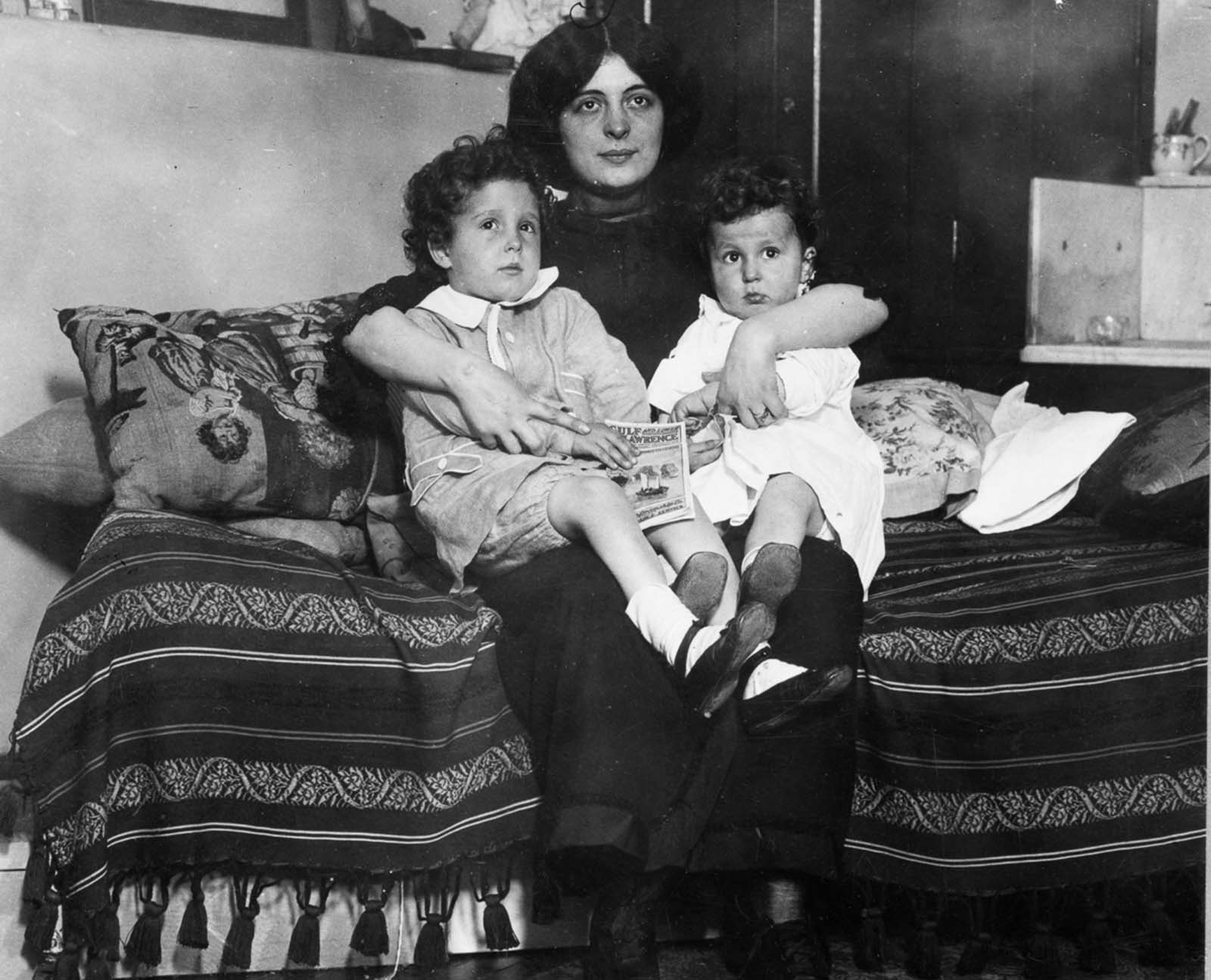#27 Edmond and Michel Navratil are reunited with their mother.