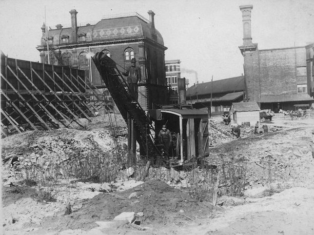#24 Excavating in the Great Fire ruins for new Customs House, Front Street and Yonge Street.