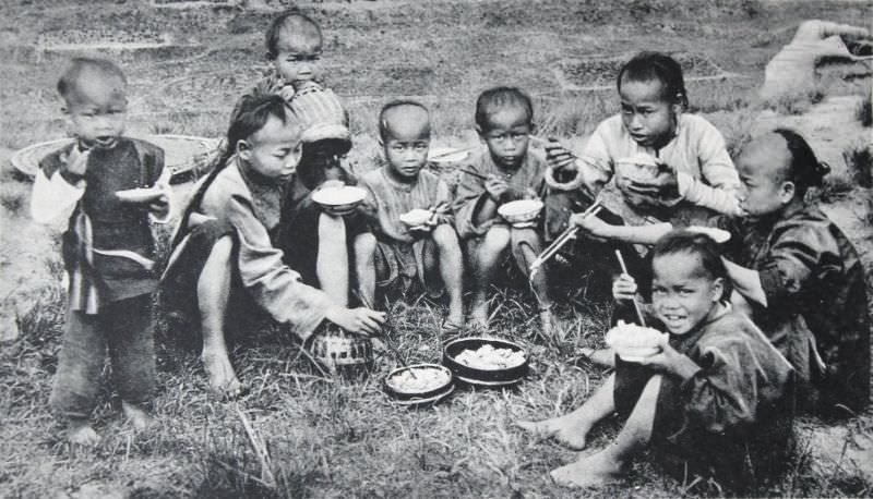 #11 Chinese boys eating on the Hill-Side, Hong Kong