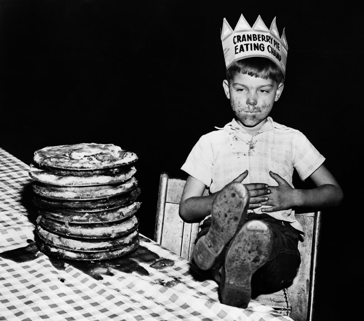 #2 Richard Baranski, 6, savors his victory after eating a 10-inch cranberry pie in 15 seconds, 1948.