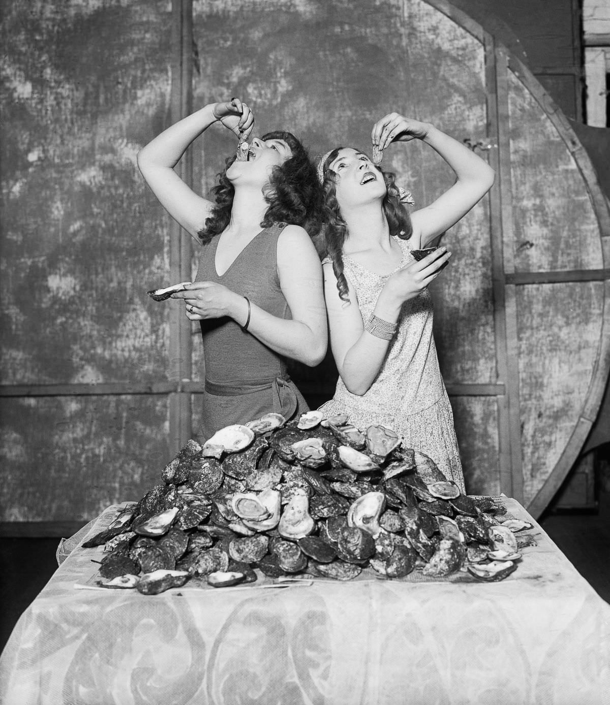 #1 Lois and Ruth Waddell devour a combined total of 204 oysters in 1920.