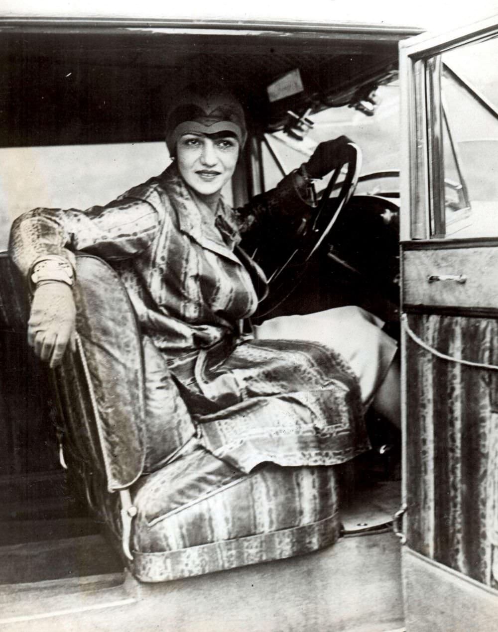 #1 One woman can be seen wearing a snakeskin outfit coordinated with her car interior, 1927.