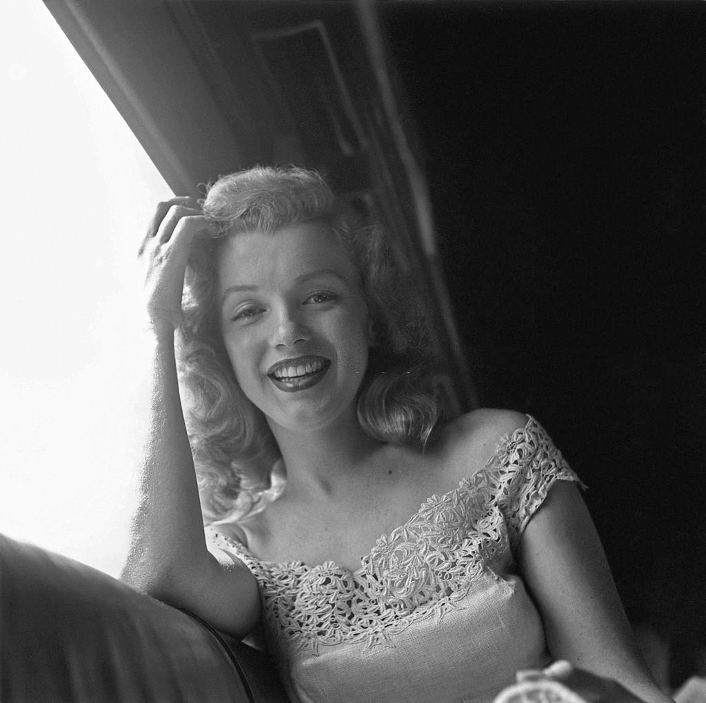 Marilyn Monroe on a train during the promotion of ‘Love Happy’, 1949.