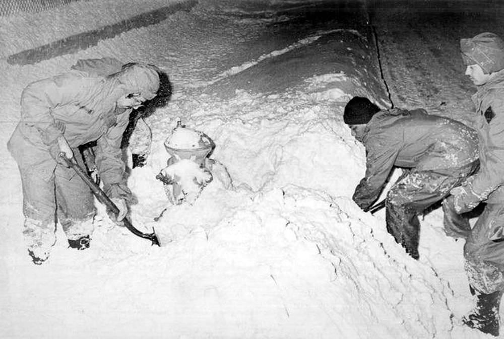 #13 Springfield firefighters dig out a hydrant on Feb. 7, 1978.