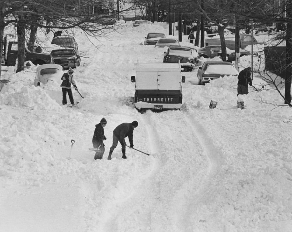 #18 Residents of Home Place., Graniteville, begin the arduous task of cleaning up from the record snow.