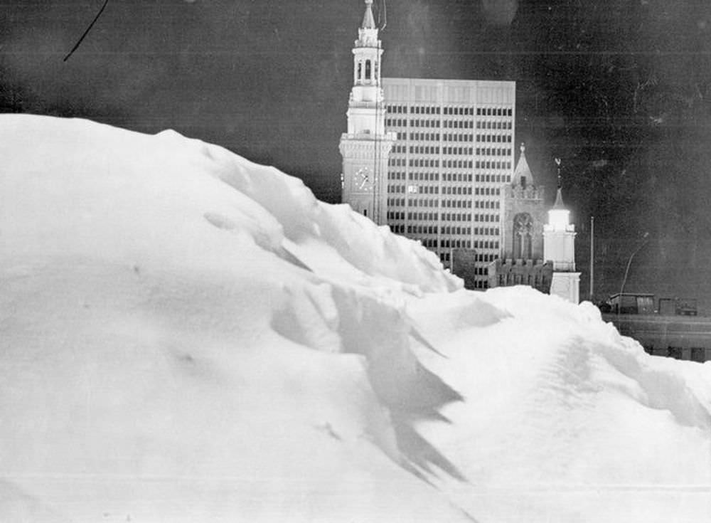 #9 A pile of snow in a parking lot frames a view of downtown Springfield during the Blizzard of 1978.