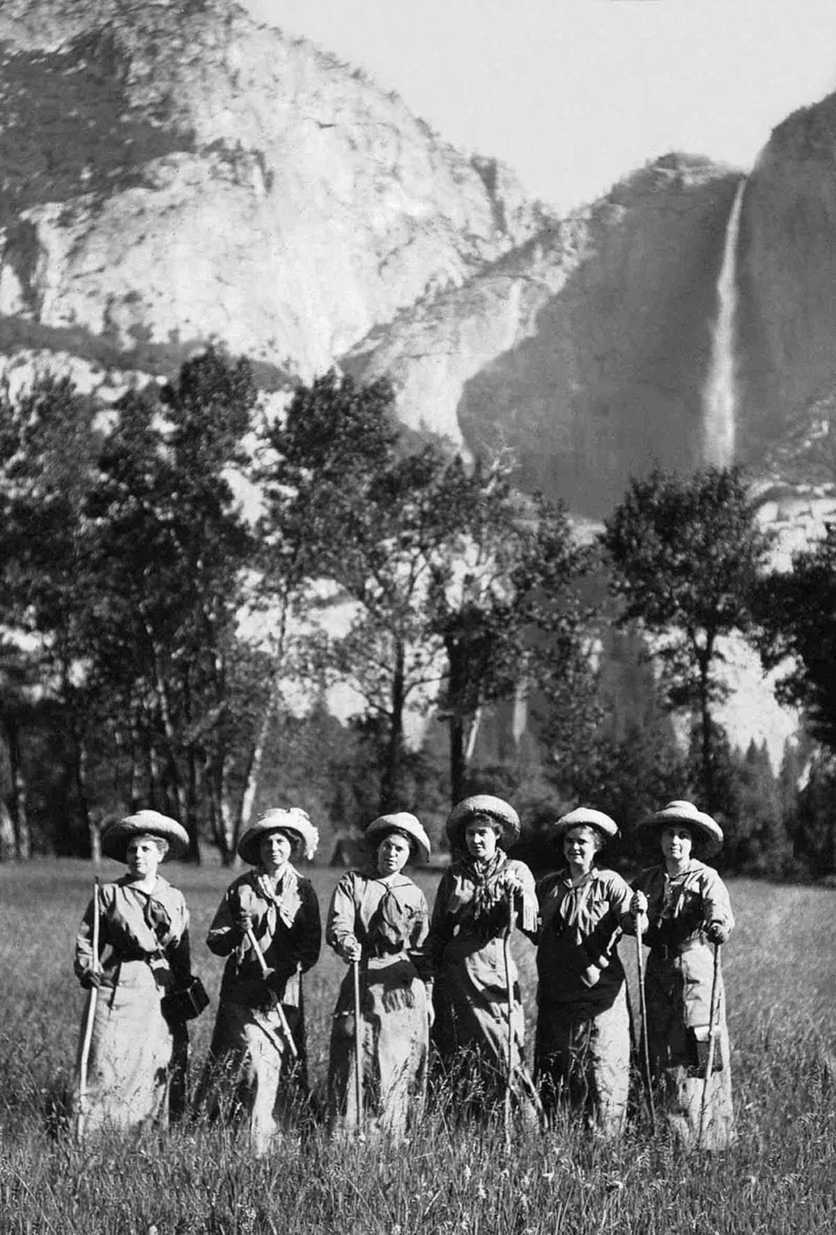 #24 Tourists pose for a picture in front of Yosemite Falls, 1900.