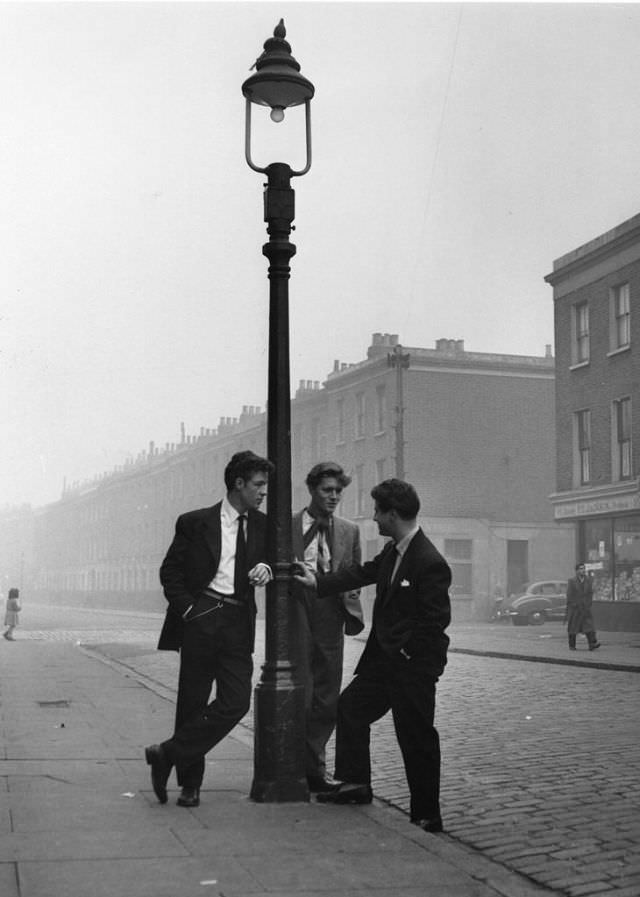 #15 A group of spivs loitering in Notting Hill, London, 1954.