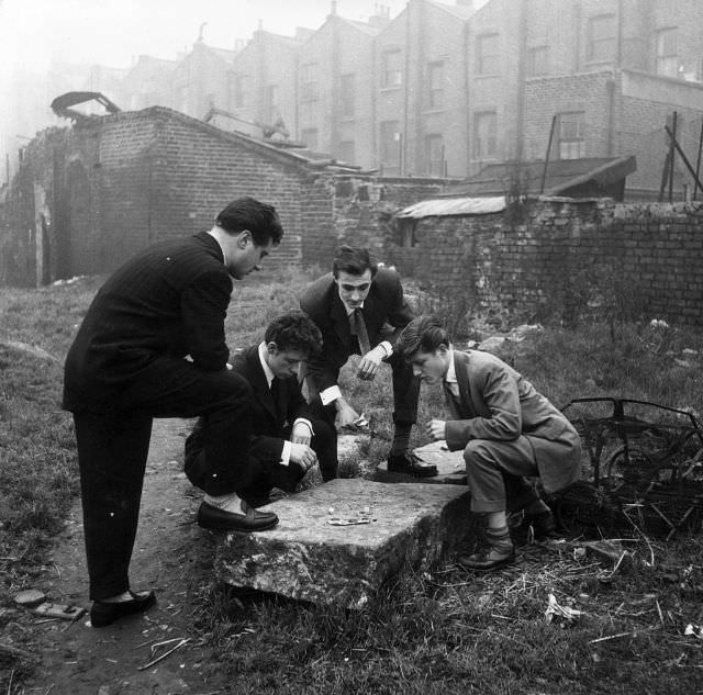 #12 A group of spivs playing dice, 1954.