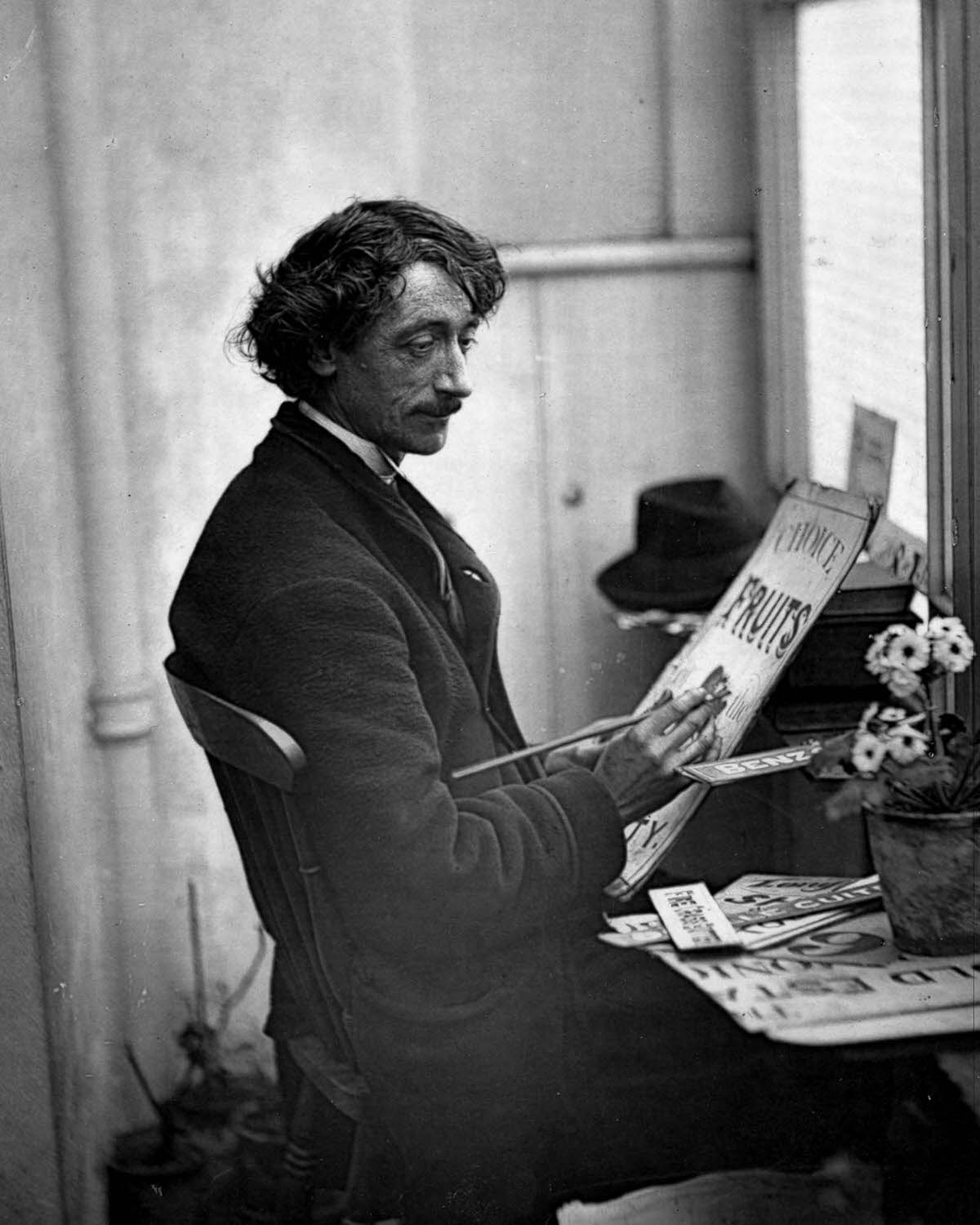 #9 A signwriter at work in his studio, 1877.