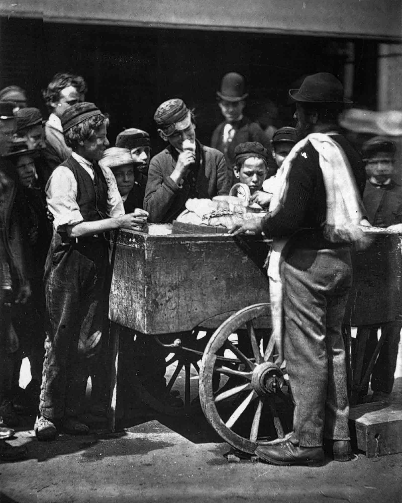#10 A street vendor sells halfpenny ices, 1876.