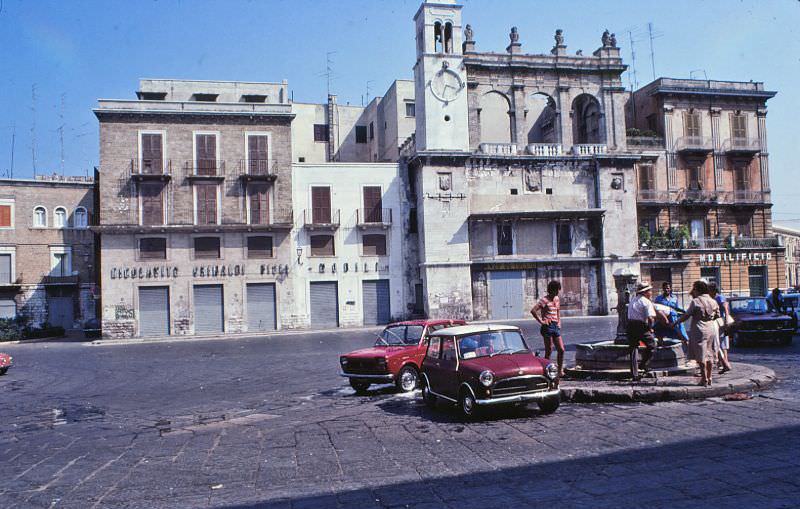 #22 Piazza Mercantile, the building with the clock tower is the Palazzo Sedile