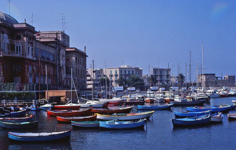 #28 View of the small-craft harbor, Bari. The Fortino di Sant’Antonio abate is visible in the distance (right), and the Teatro Margherita is visible at the left