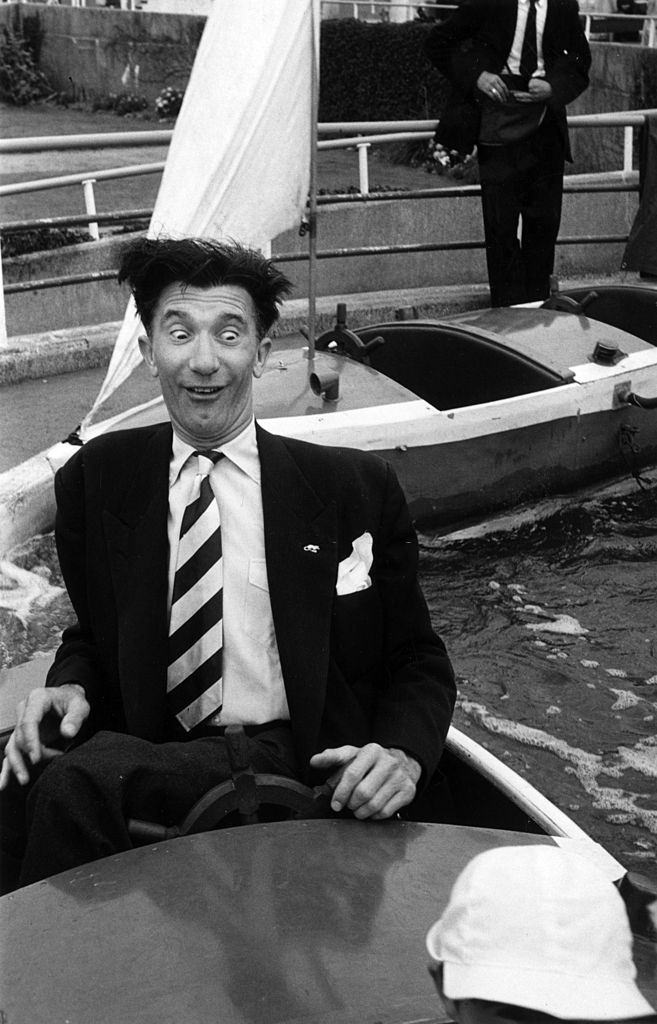 #17 Blackpool comedian Nat Jackley taking his son for a ride on the Pleasure Beach, 1953.