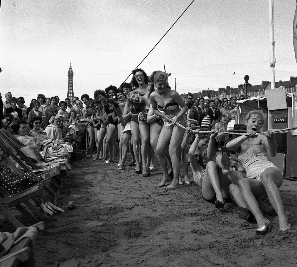 #69 Sunday pictorial beach contest at Blackpool. Competitors take part in a game of tug o war, 1958