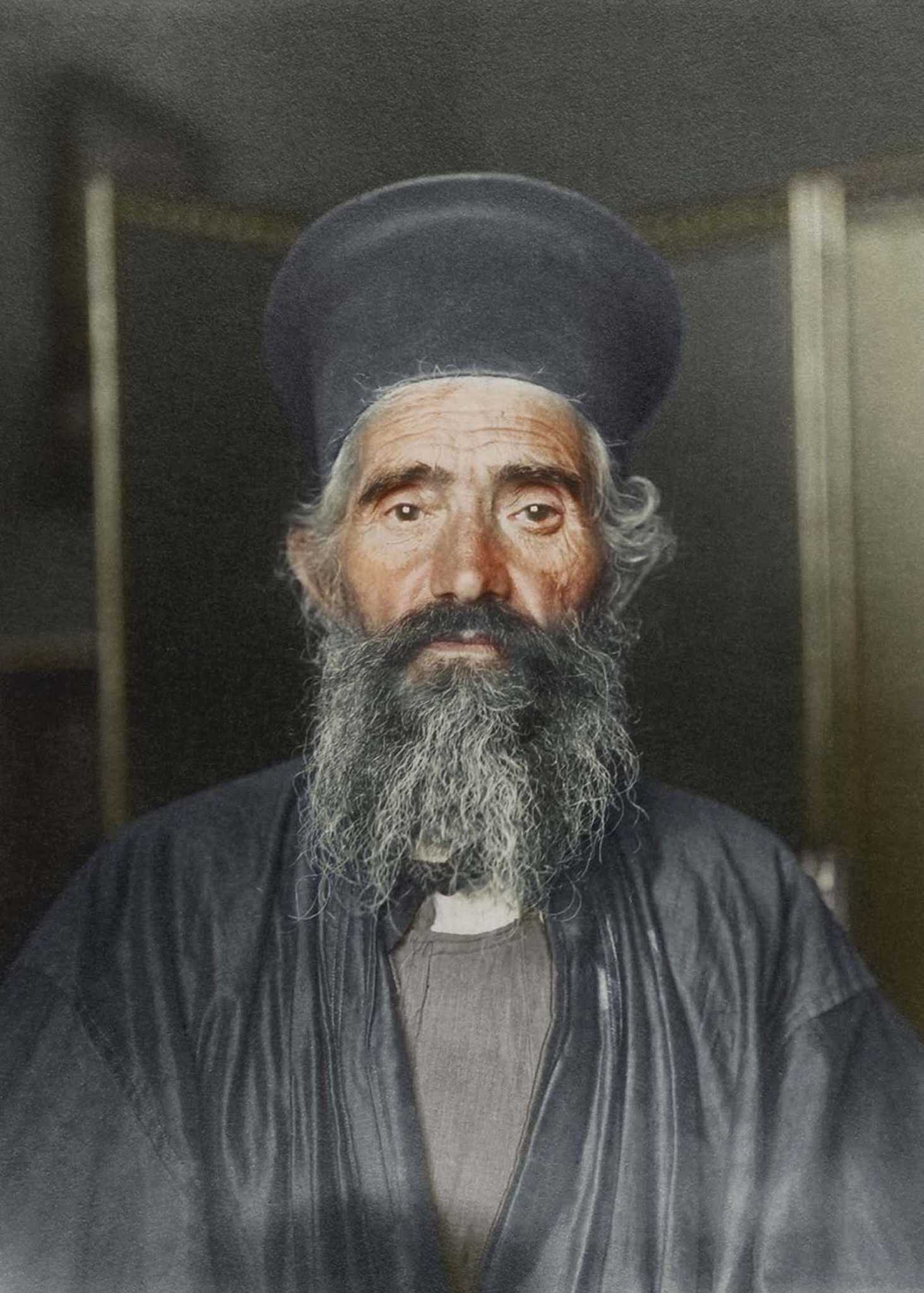#7 Rev. Joseph Vasilon, Greek-Orthodox priest.” The vestments of the Greek Orthodox church have remained largely unchanged. In this photograph, the priest wears an anteri, an ankle-length cassock (from the Turkish quzzak, from which the term ‘Cossack’ also derives) worn by all clergymen over which an a
