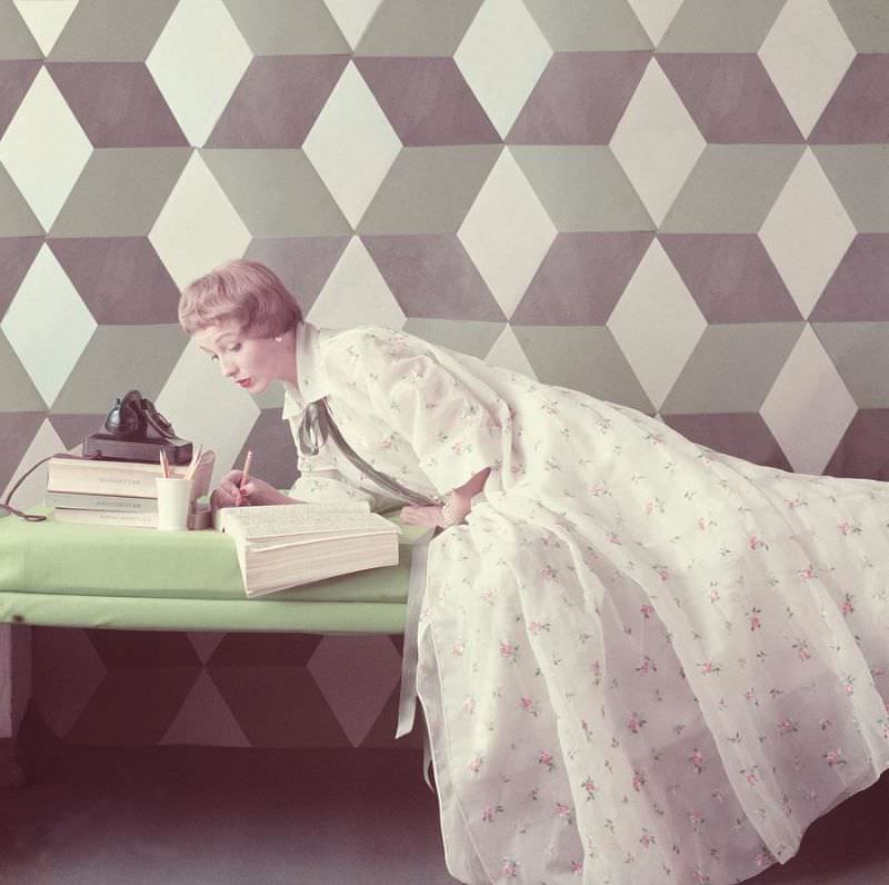#20 Model wearing a floral dressing gown, 1953