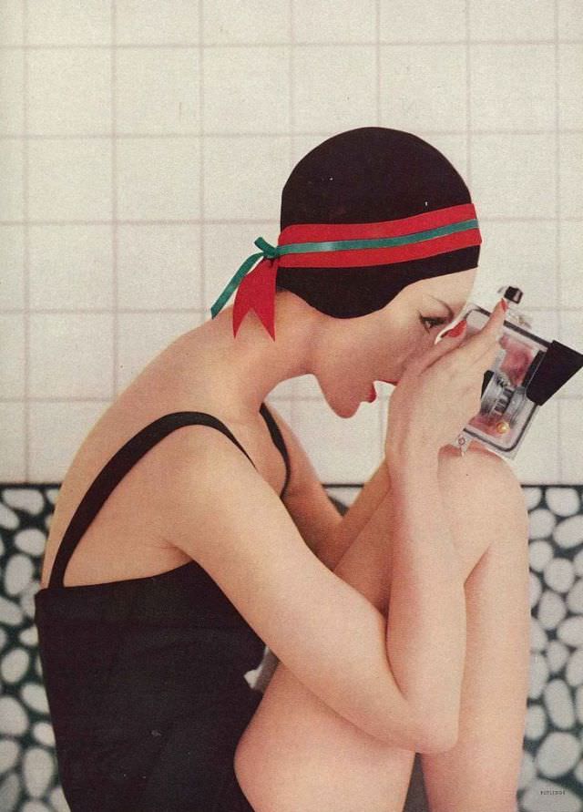 #13 Model wearing bathing cap, Vogue, June 1956