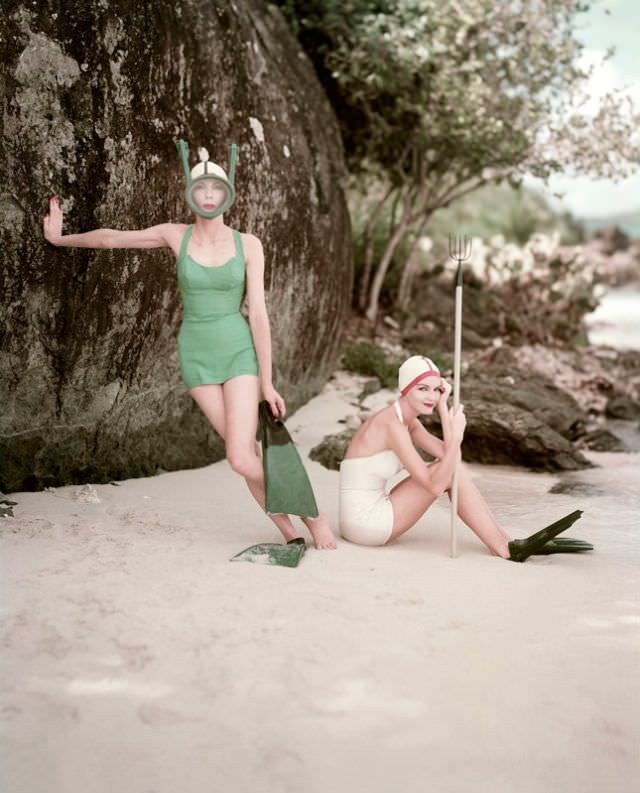 #23 Two models in Rose Marie Reid swimsuits, 1957