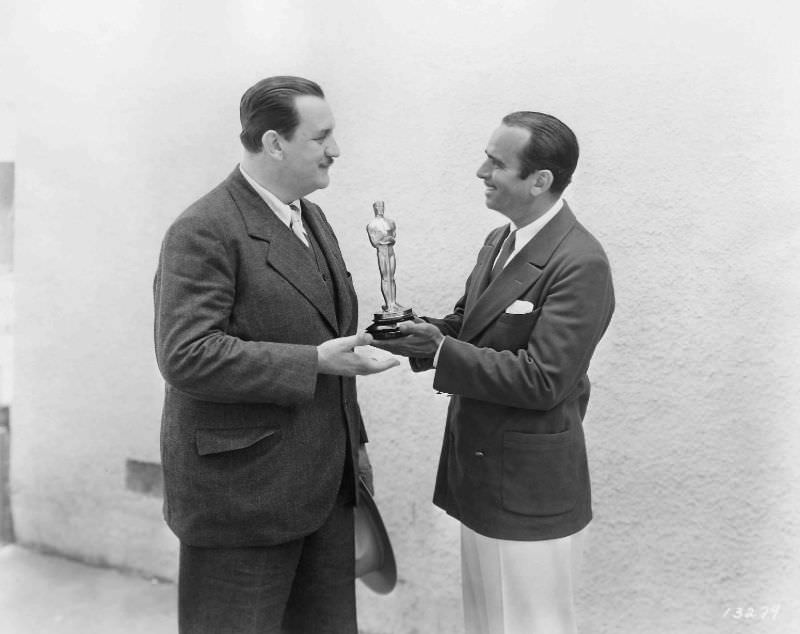 Douglas Fairbanks, who hosted the ceremony, presents Joseph Farnham with his award in 1929