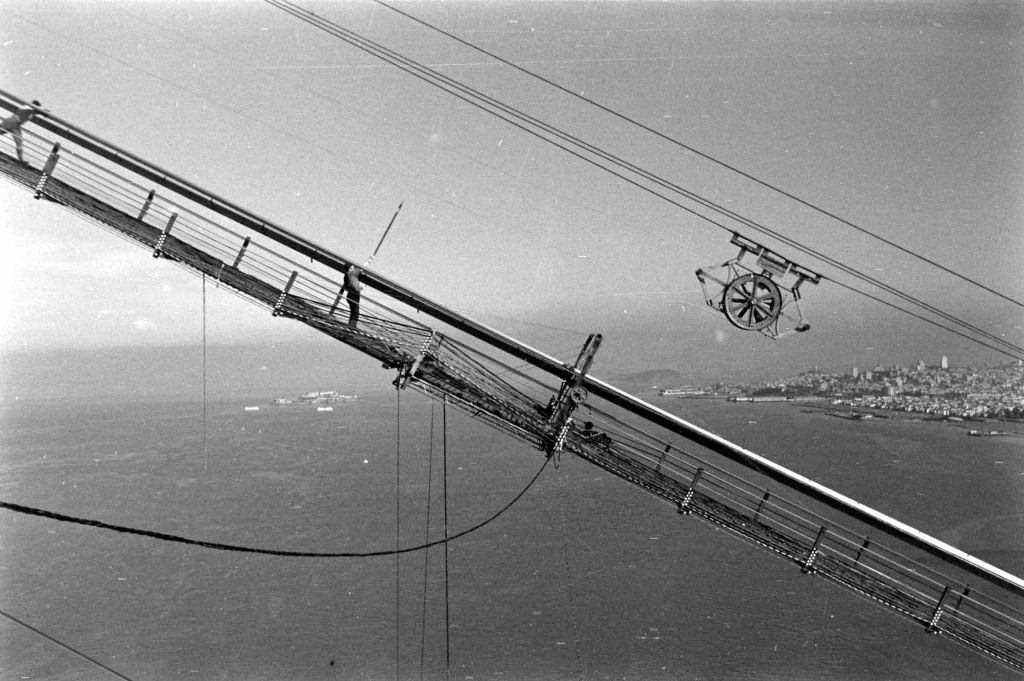 #41 Aerial view of cables during the construction of the Golden Gate Bridge in San Francisco.