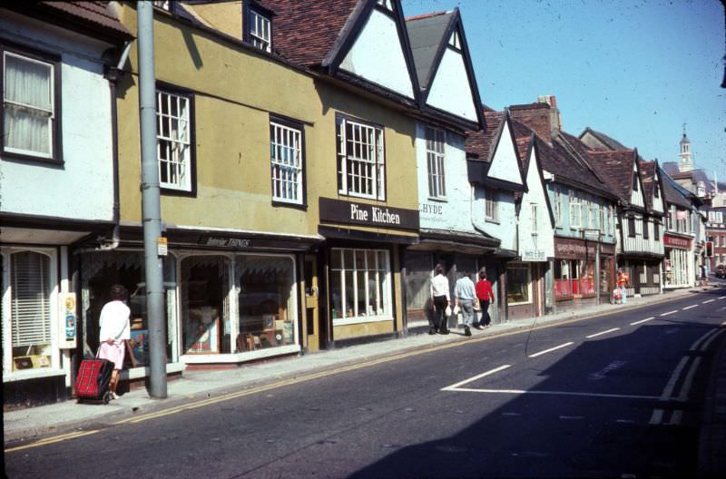 #31 The west side of St Nicholas St looking north from Franciscan Way (left) to Friars St. with the top of the Town Hall in right background
