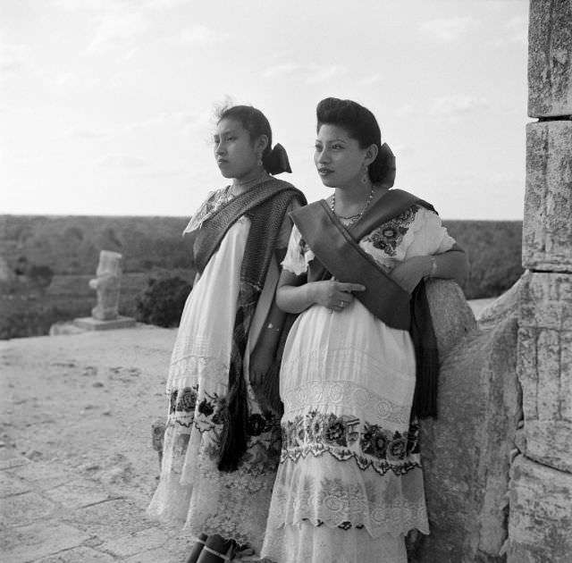 #12 Local women pose at ruins of one of the largest Maya cities of the Terminal Classic in Chichen Itza.