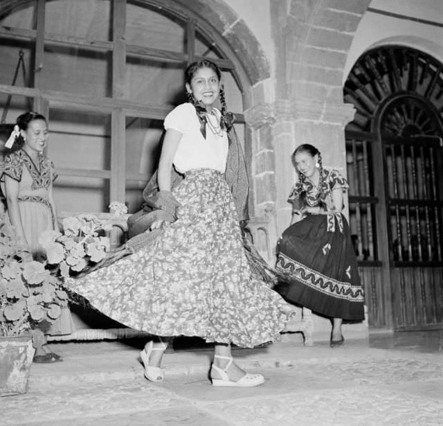 #9 Local women perform on a street in San Miguel de Allende.