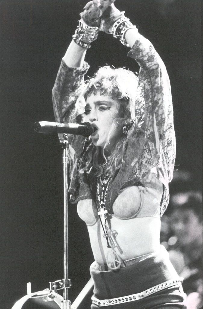 #24 Madonna performs onstage at Madison Square Garden in 1984 in New York City