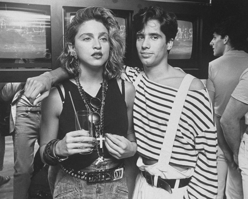 #30 Madonna with D.J. Jellybean Benitez at opening of video club Private Eyes, 1984.