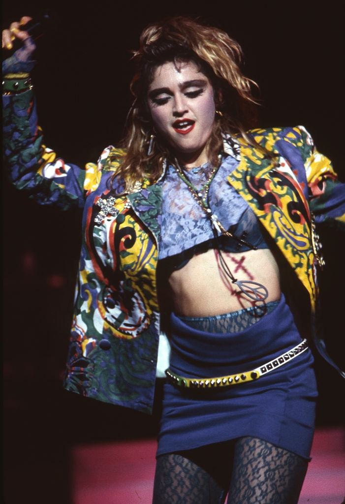 #38 Madonna performs on stage during her Virgin Tour, Radio City Music Hall, 1985.
