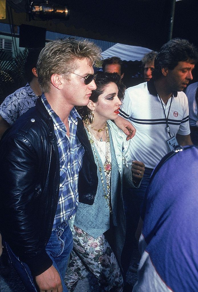 #61 Madonna with her husband Sean Penn, 1986.
