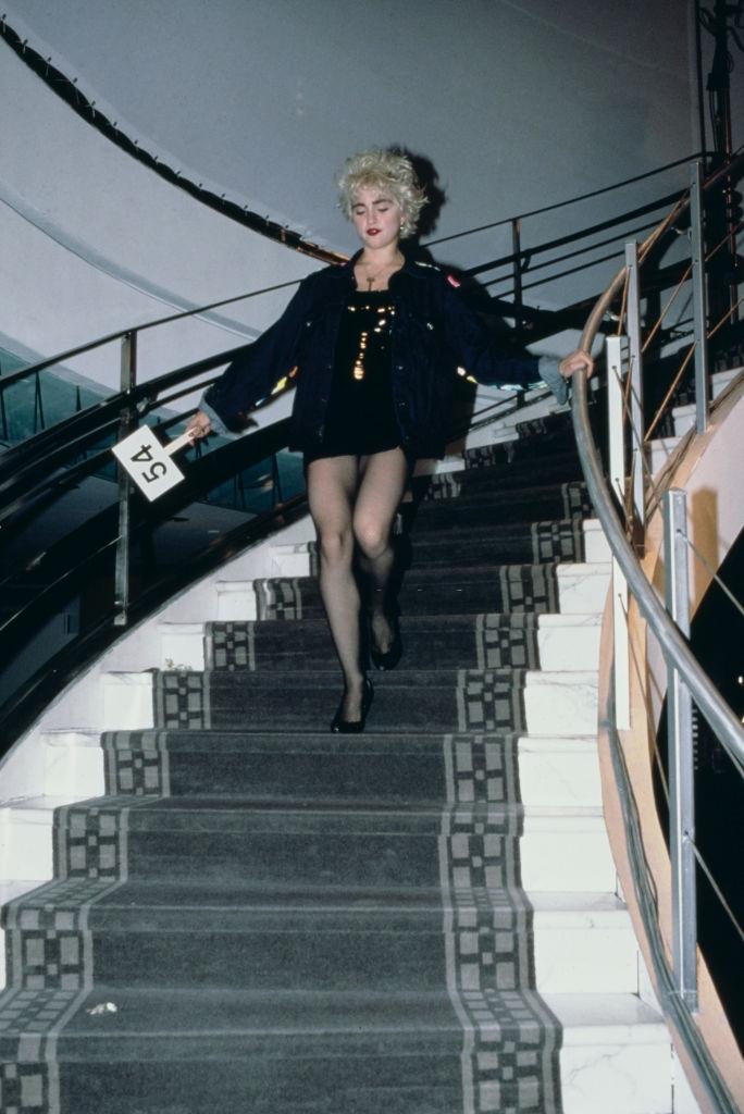 #7 Madonna takes part in a celebrity fashion show at Barneys clothing store in New York City, 10th November 1986.