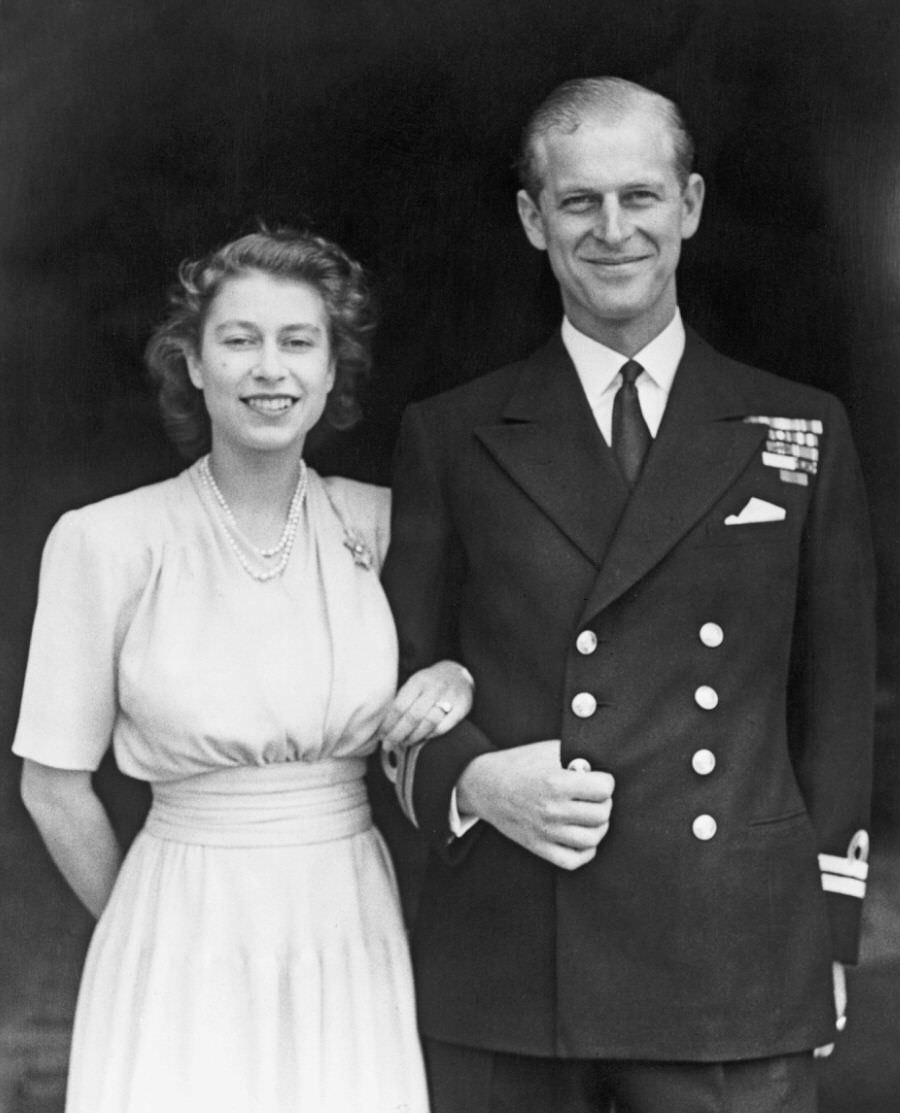 #32 Prince Philip with Princess Elizabeth posing for a photo shortly after they announced their engagement, 1947.