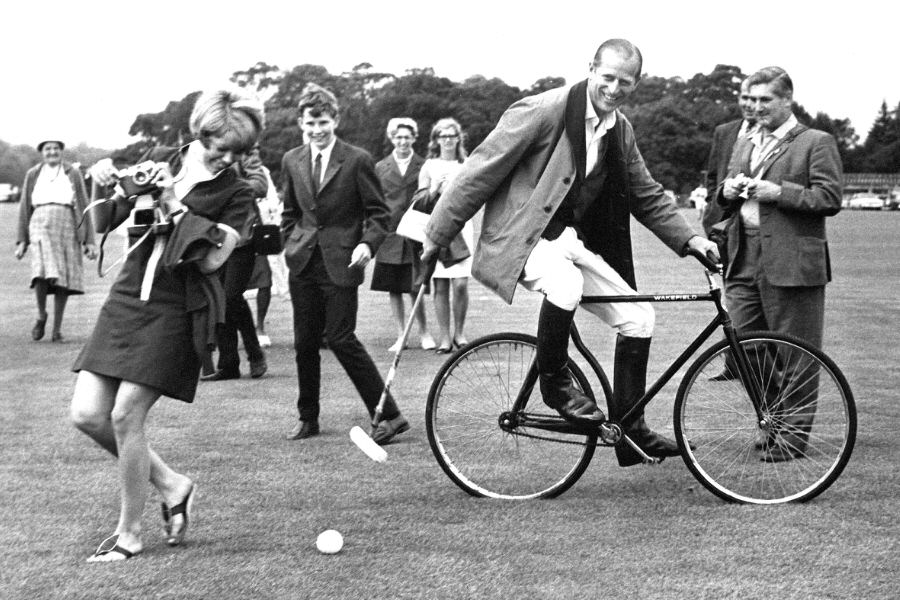 #56 Philip playing bicycle polo, 1964.