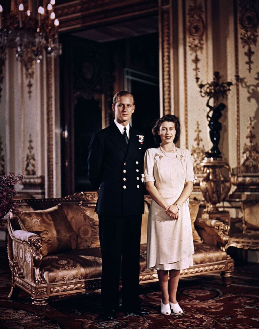 #39 Princess Elizabeth and Prince Philip, Duke of Edinburgh at Buckingham Palace shortly before their wedding, 1947.