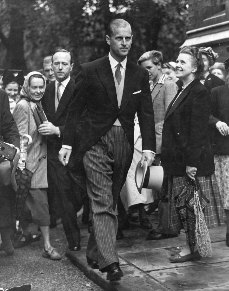 #42 Prince Philip a wedding in London, 1951.