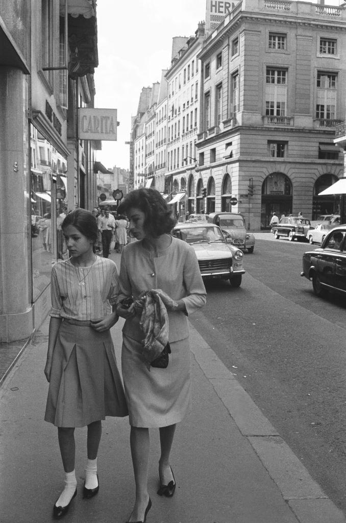 #60 Anouk Aimée and her daughter Manuela Papatakis boulevard Saint-Honoré, in the 1960s.