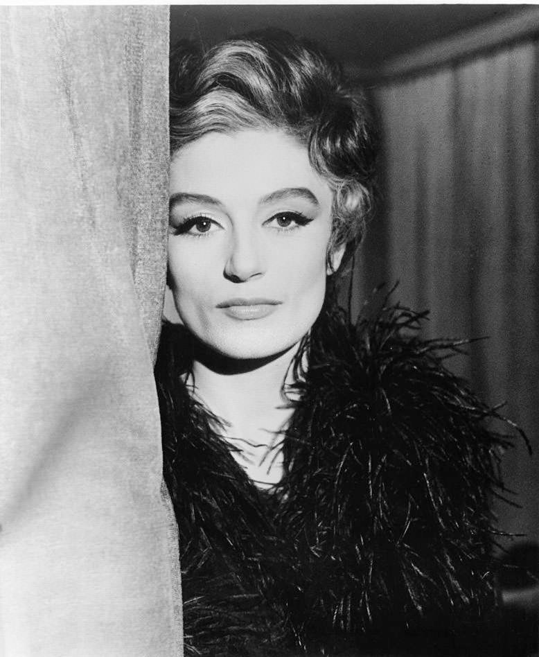 #63 Anouk Aimee as a highly sophisticated interior decorator in a scene from the film ‘La Fuga’, 1964.