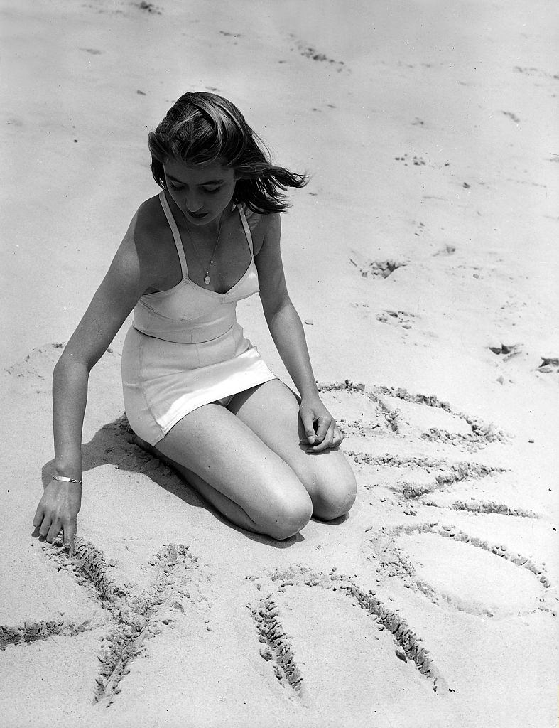 #4 Anouk Aimee on the beach, 1950s.