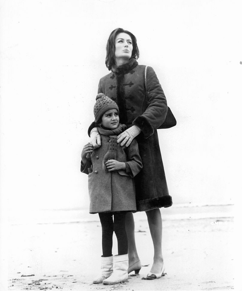 #28 Anouk Aimée with child in a scene from the film ‘A Man And A Woman’, 1966.